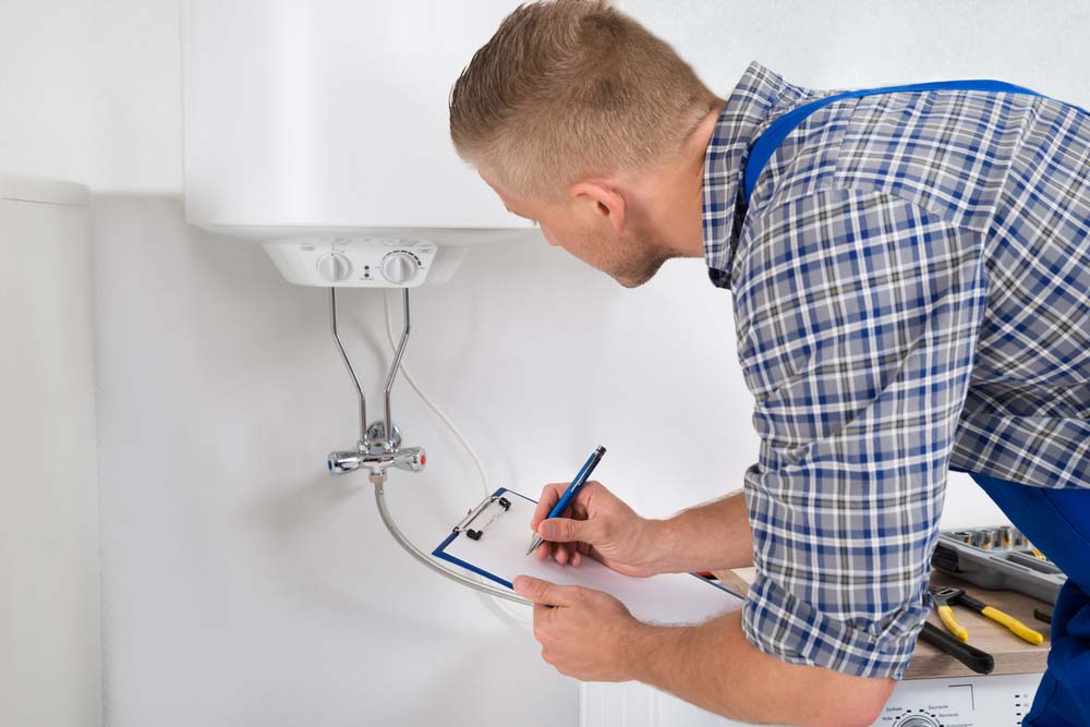 plumber holding a clipboard, performing an inspection