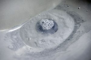 standing water in a blocked drain