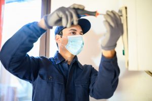 plumber installing a water heater Menifee, CA